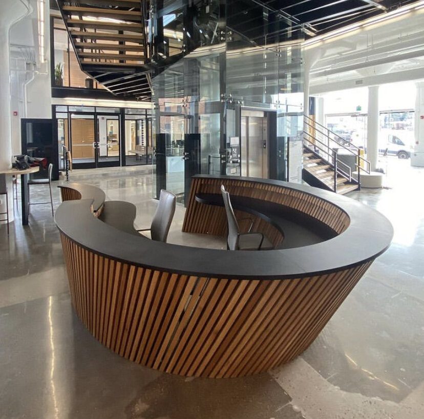 Curved reception desk, wood and steel